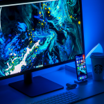 A matching background for a desktop and mobile phone setup representing branding and consistency across channels with a blue theme in a portrait cropping ratio