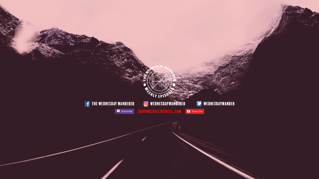The Wednesday Wanderer logo in white with the social media channels and handles with a red colored photo of a road through a mountain with fog coming in over the top.